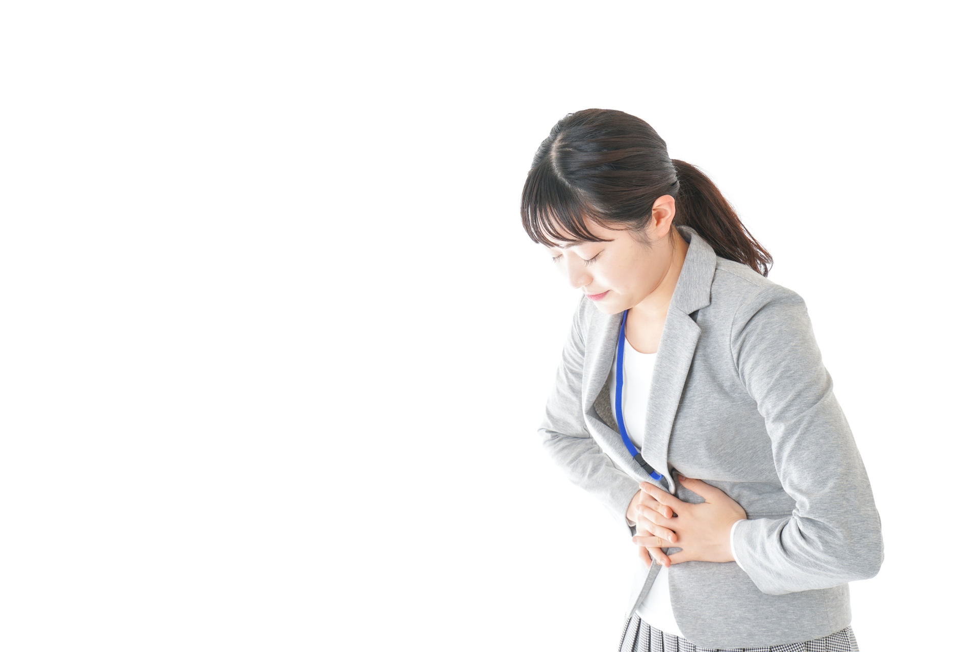 腹痛で苦しむ女性
